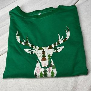 Green holiday sweater